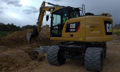 Location de Pelle sur pneus CAT M315 F